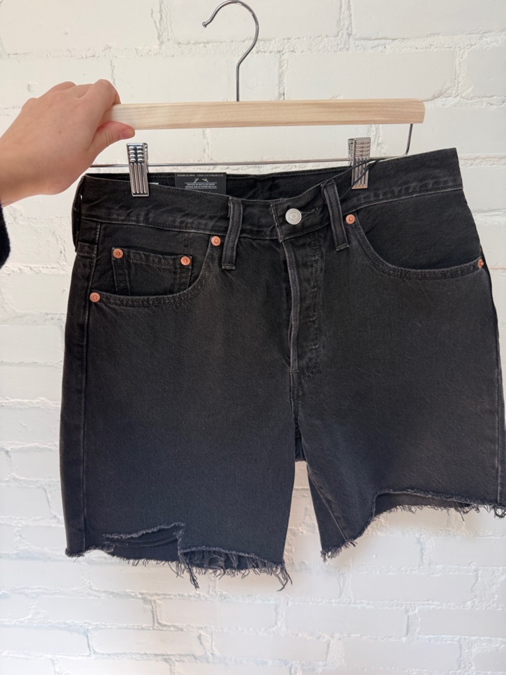Levi's Black Raw Hem Denim Shorts -size 28 (fits small)